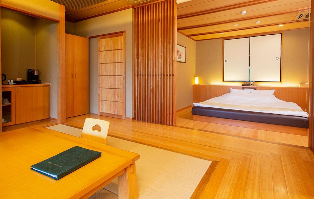 Bettei Soan Hotel Minamiaso Bagian luar foto