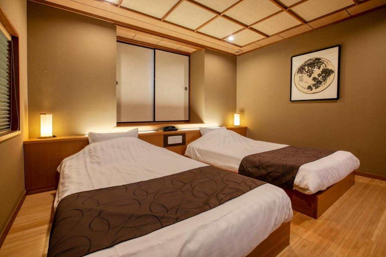 Bettei Soan Hotel Minamiaso Bagian luar foto