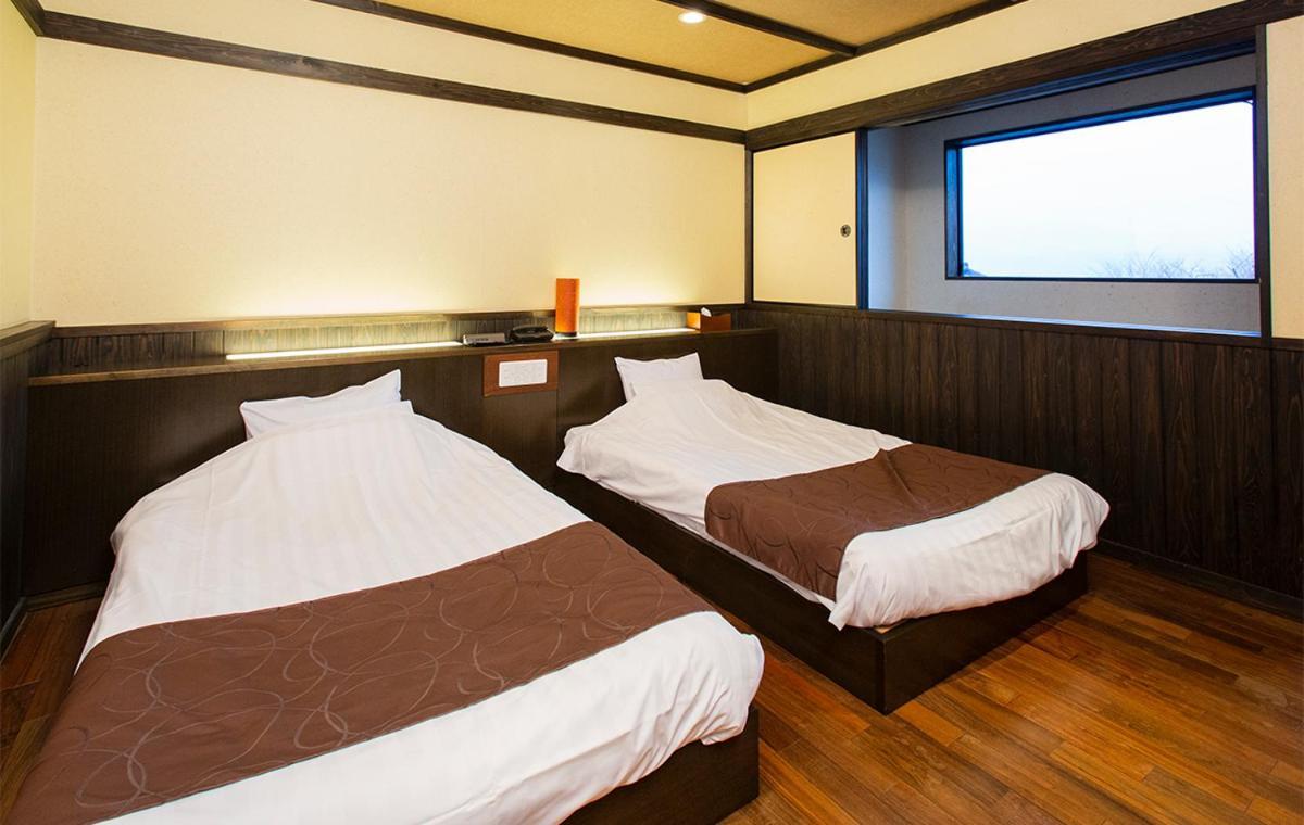 Bettei Soan Hotel Minamiaso Bagian luar foto