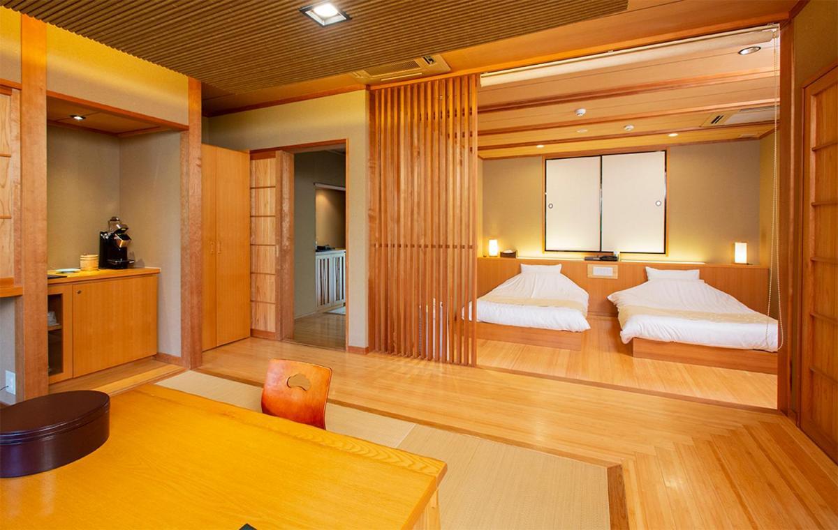 Bettei Soan Hotel Minamiaso Bagian luar foto